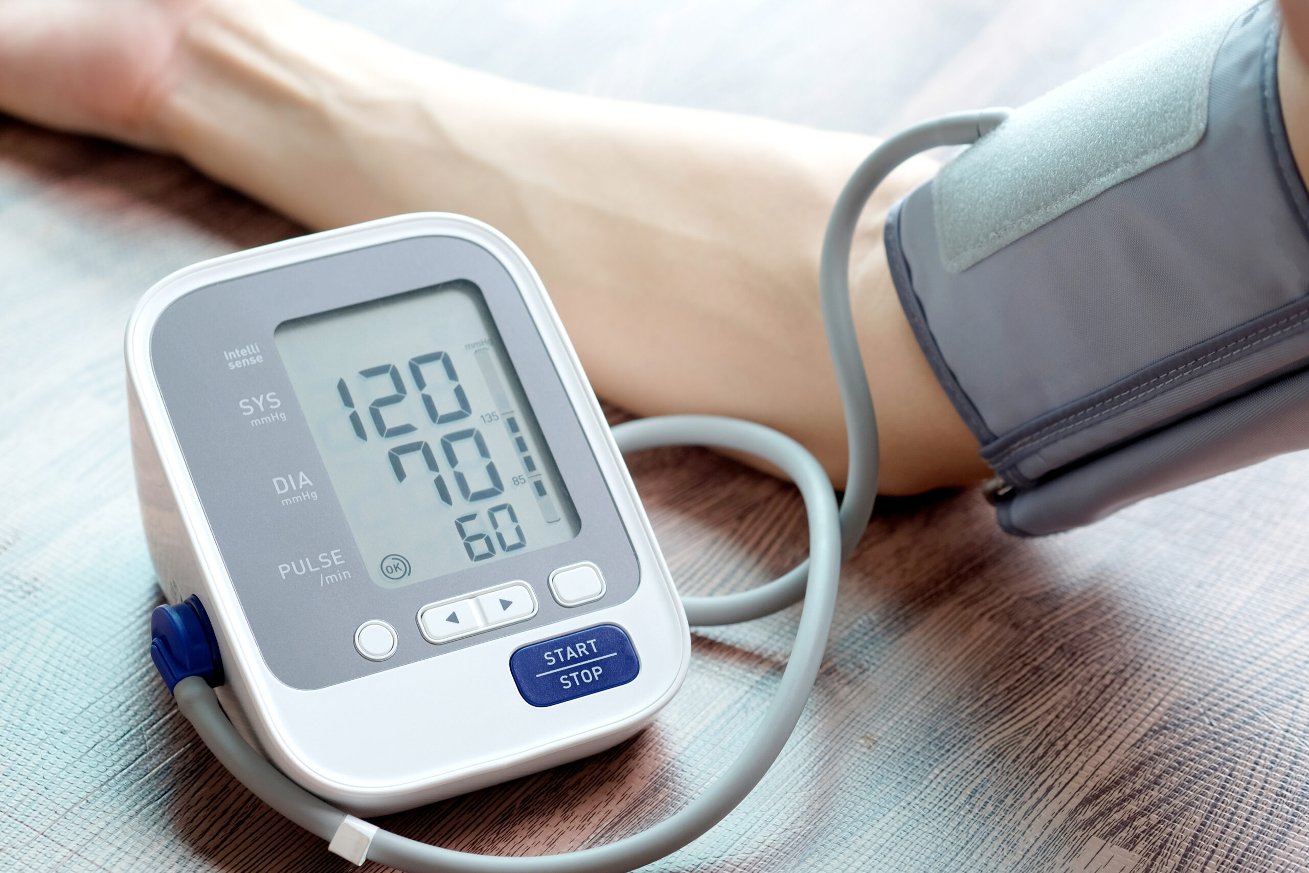 Man check blood pressure monitor and heart rate monitor with digital pressure gauge. Health care and Medical concept